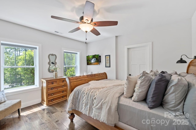9 Oak Mountain Dr, Leicester, NC 28748 - bedroom featuring wood finished floors, baseboards, and a ceiling fan