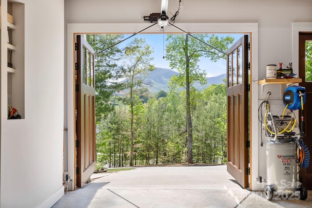9 Oak Mountain Dr, Leicester, NC 28748 - interior space with a mountain view, healthy amount of natural light, and a wooded view