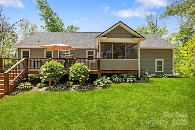 9 Oak Mountain Dr, Leicester, NC 28748 - back of property featuring a wooden deck, a lawn, and roof with shingles