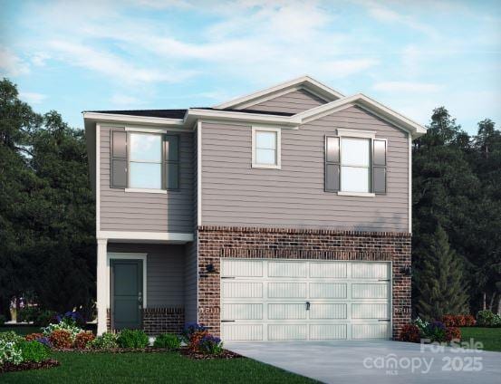 view of front of property featuring an attached garage, driveway, and brick siding