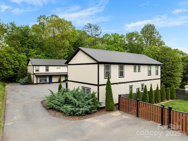 12 Martin Valley Rd, Swannanoa, NC 28778 - view of front of house featuring fence and metal roof