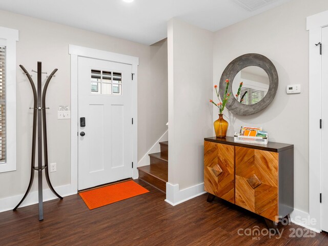 12 Martin Valley Rd, Swannanoa, NC 28778 - entrance foyer featuring dark wood finished floors, baseboards, and stairway