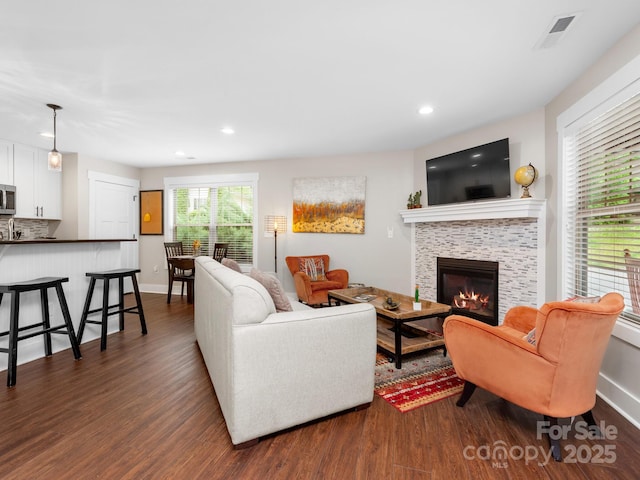 12 Martin Valley Rd, Swannanoa, NC 28778 - living room with dark wood-type flooring, a fireplace, recessed lighting, and baseboards