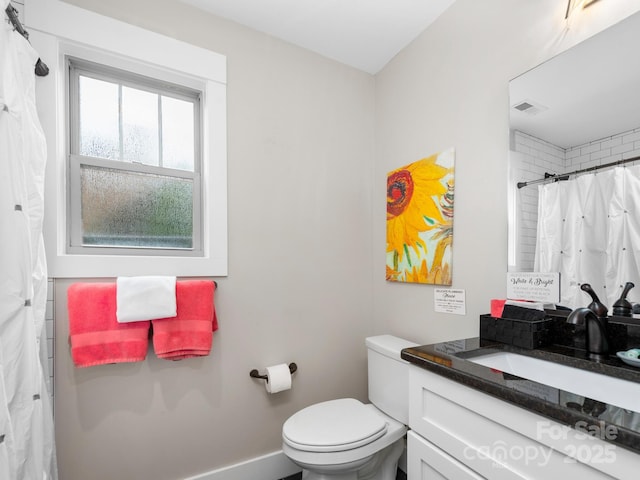 12 Martin Valley Rd, Swannanoa, NC 28778 - bathroom featuring toilet, vanity, a shower with shower curtain, and baseboards
