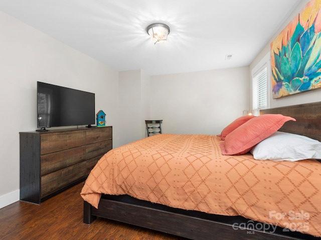 12 Martin Valley Rd, Swannanoa, NC 28778 - bedroom with dark wood-type flooring and baseboards