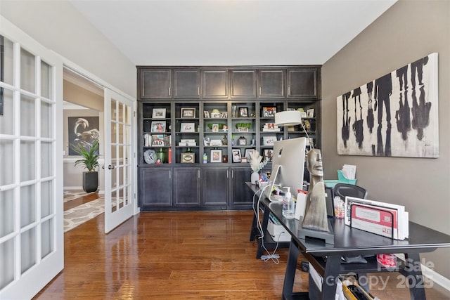 office space with french doors and wood finished floors