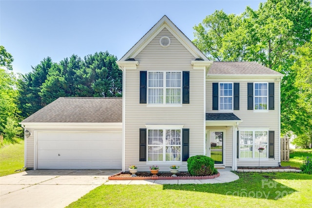 1605 Tate Rd Unit 258, Rock Hill, SC 29732 - view of front of house with driveway, an attached garage, a front yard, and a shingled roof