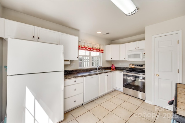 1605 Tate Rd Unit 258, Rock Hill, SC 29732 - kitchen with white appliances, a sink, dark countertops, white cabinets, and light tile patterned floors