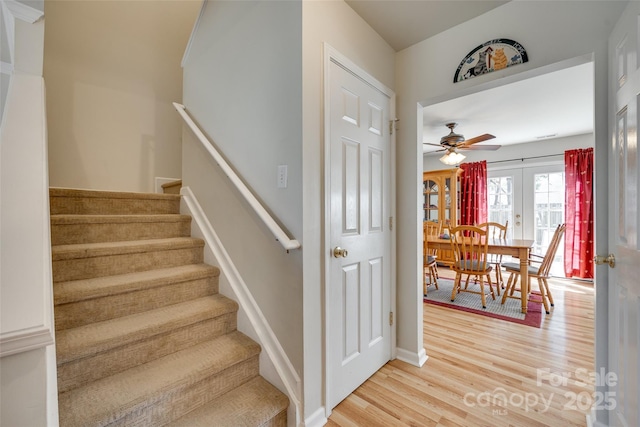 1605 Tate Rd Unit 258, Rock Hill, SC 29732 - stairway with french doors, wood finished floors, a ceiling fan, and baseboards