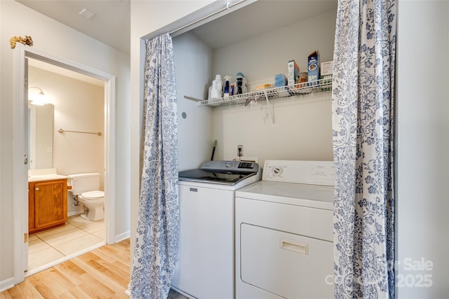 1605 Tate Rd Unit 258, Rock Hill, SC 29732 - laundry room featuring separate washer and dryer, light wood finished floors, and baseboards