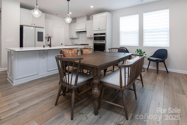 3252 Cheyney Park Dr, Charlotte, NC 28269 - dining area with baseboards, recessed lighting, visible vents, and light wood-type flooring