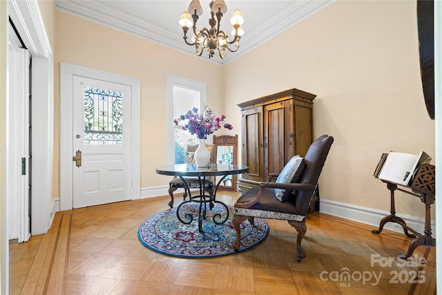 116 N Mulberry St, Statesville, NC 28677 - foyer with crown molding, a chandelier, and baseboards
