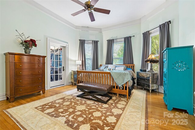 116 N Mulberry St, Statesville, NC 28677 - bedroom featuring multiple windows, wood-type flooring, ceiling fan, and ornamental molding