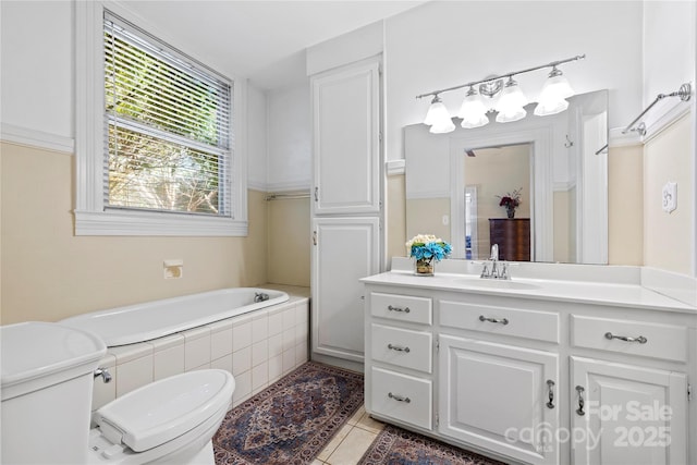 116 N Mulberry St, Statesville, NC 28677 - full bath featuring toilet, tile patterned flooring, tiled tub, and vanity