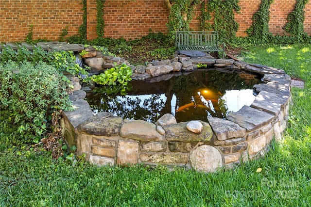 116 N Mulberry St, Statesville, NC 28677 - exterior view of a small pond and brick siding