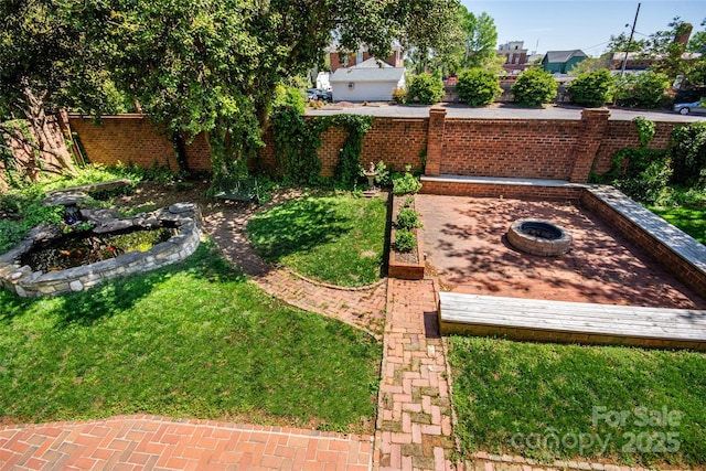 116 N Mulberry St, Statesville, NC 28677 - view of yard featuring a fire pit