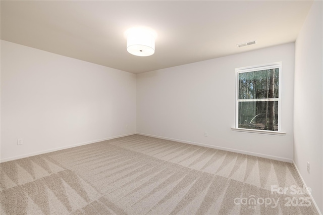 1604 Breezewood Dr, Charlotte, NC 28262 - carpeted empty room featuring visible vents and baseboards