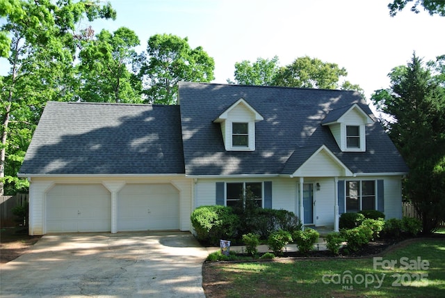177 Line Dr, Forest City, NC 28043 - cape cod house featuring a garage and concrete driveway