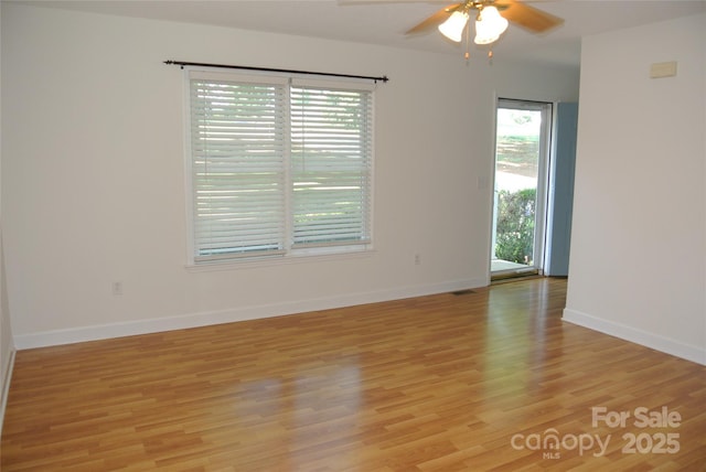177 Line Dr, Forest City, NC 28043 - unfurnished room featuring baseboards, ceiling fan, and light wood-type flooring