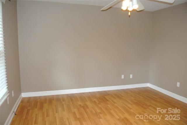 177 Line Dr, Forest City, NC 28043 - spare room featuring ceiling fan, baseboards, and light wood-type flooring