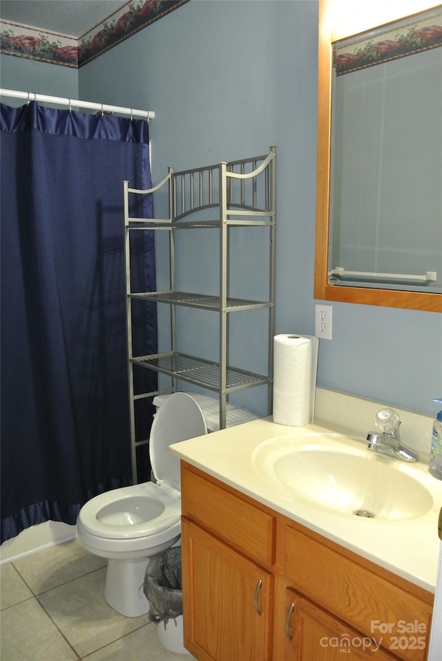 177 Line Dr, Forest City, NC 28043 - full bathroom featuring toilet, tile patterned floors, a shower with shower curtain, and vanity