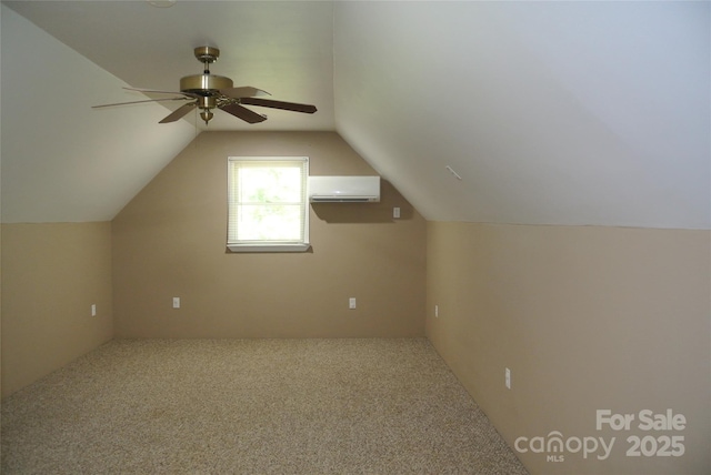 177 Line Dr, Forest City, NC 28043 - additional living space with ceiling fan, a wall mounted AC, carpet, and vaulted ceiling