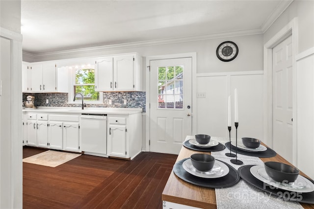 kitchen with a wealth of natural light, white cabinetry, and dishwasher