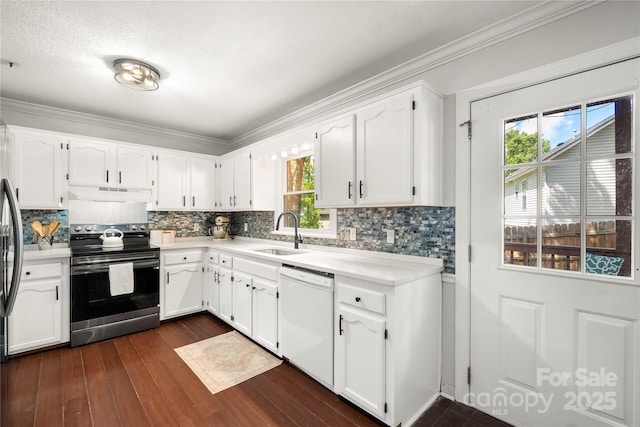 kitchen featuring white dishwasher, stainless steel electric range, a sink, extractor fan, and white cabinetry