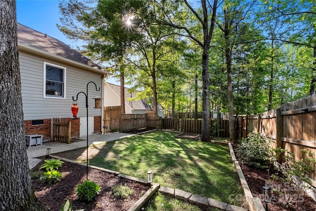 view of yard featuring a fenced backyard