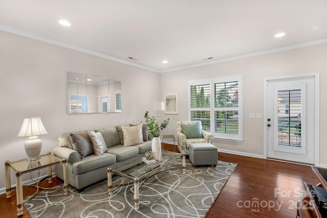 living room featuring baseboards, recessed lighting, and wood finished floors