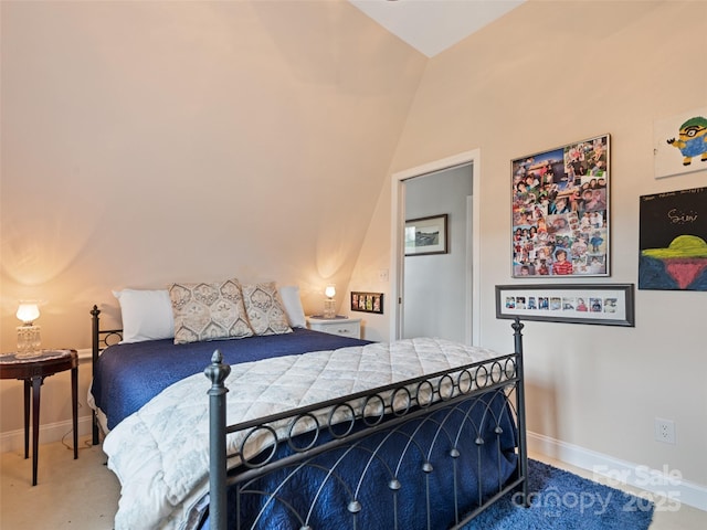 6780 Max Patch Rd, Clyde, NC 28721 - bedroom with baseboards, carpet flooring, and lofted ceiling