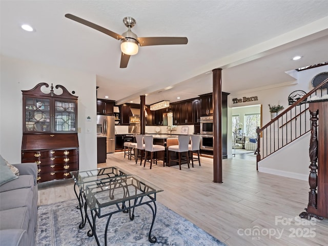 6780 Max Patch Rd, Clyde, NC 28721 - living room featuring a ceiling fan, light wood-type flooring, stairway, and recessed lighting