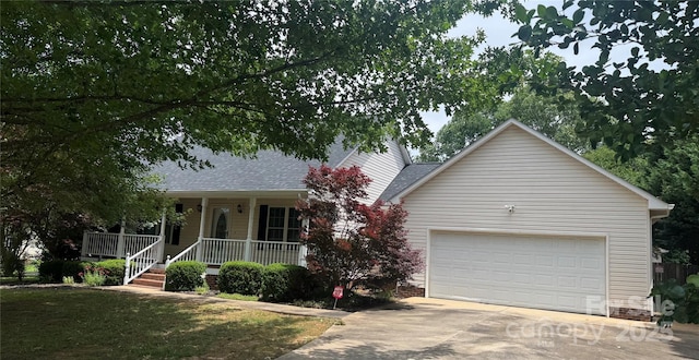 165 Graceland Pl, Salisbury, NC 28146 - view of front of home featuring covered porch, concrete driveway, and a shingled roof
