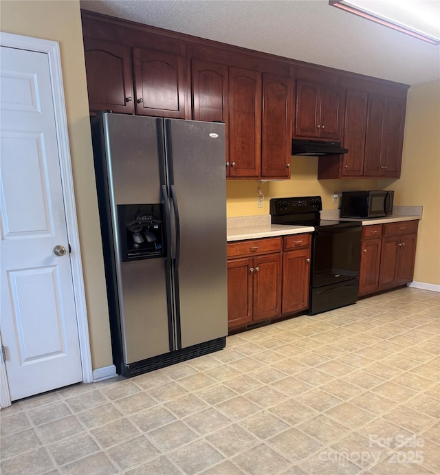 165 Graceland Pl, Salisbury, NC 28146 - kitchen with black appliances, under cabinet range hood, light countertops, baseboards, and light floors