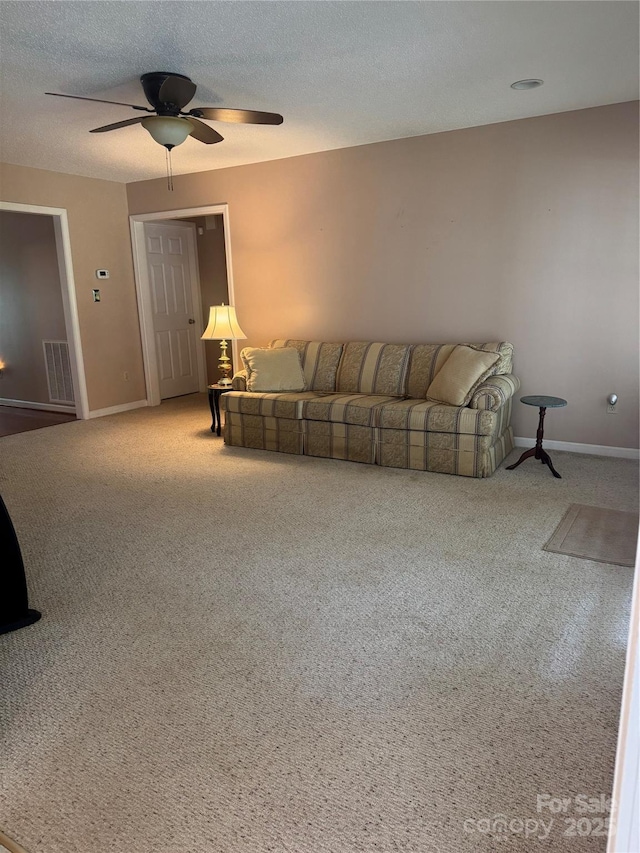 165 Graceland Pl, Salisbury, NC 28146 - carpeted living area with ceiling fan and baseboards