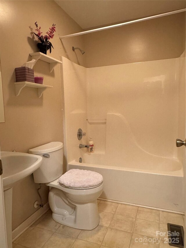 165 Graceland Pl, Salisbury, NC 28146 - full bathroom featuring toilet, shower / bathtub combination, and tile patterned floors