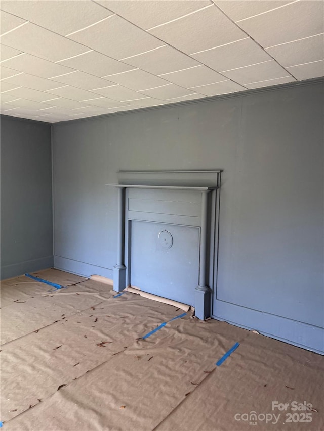 interior space featuring a paneled ceiling