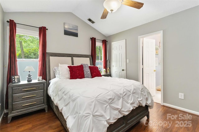 6736 Raeburn Ln, Charlotte, NC 28227 - bedroom with visible vents, baseboards, dark wood-type flooring, a ceiling fan, and vaulted ceiling