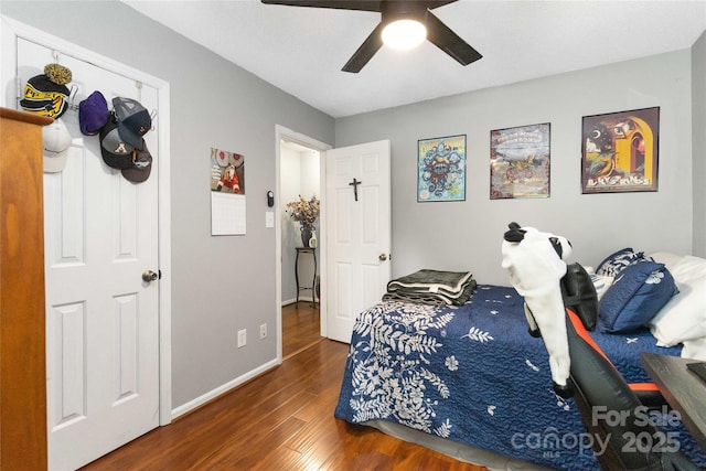 6736 Raeburn Ln, Charlotte, NC 28227 - bedroom with baseboards, ceiling fan, and wood finished floors
