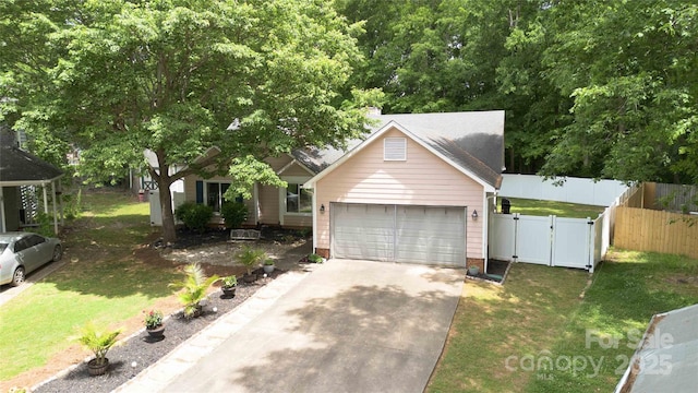 6736 Raeburn Ln, Charlotte, NC 28227 - view of front of property featuring driveway, a front yard, a gate, a garage, and fence