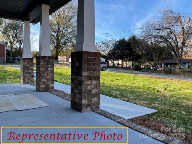 view of community with a lawn