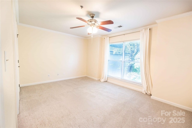 525 N Graham St Unit 3F, Charlotte, NC 28202 - carpeted spare room featuring baseboards, crown molding, ceiling fan, and visible vents