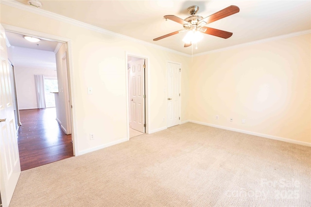 525 N Graham St Unit 3F, Charlotte, NC 28202 - carpeted spare room with baseboards, ornamental molding, and ceiling fan