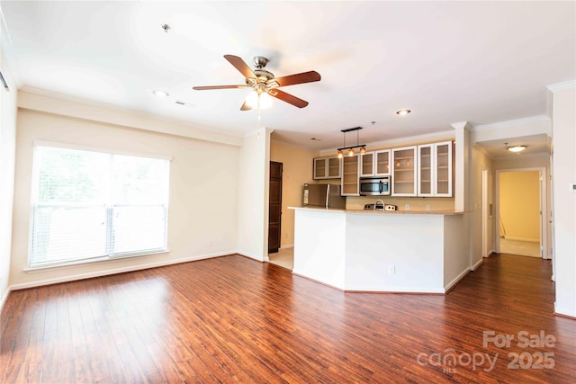 525 N Graham St Unit 3F, Charlotte, NC 28202 - unfurnished living room with baseboards, ornamental molding, and ceiling fan