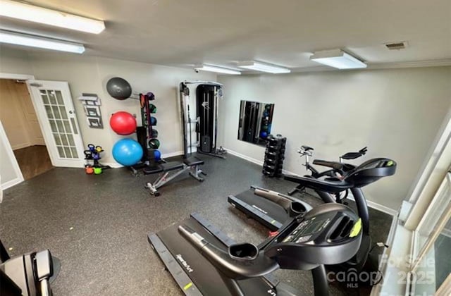 525 N Graham St Unit 3F, Charlotte, NC 28202 - workout area featuring baseboards and visible vents