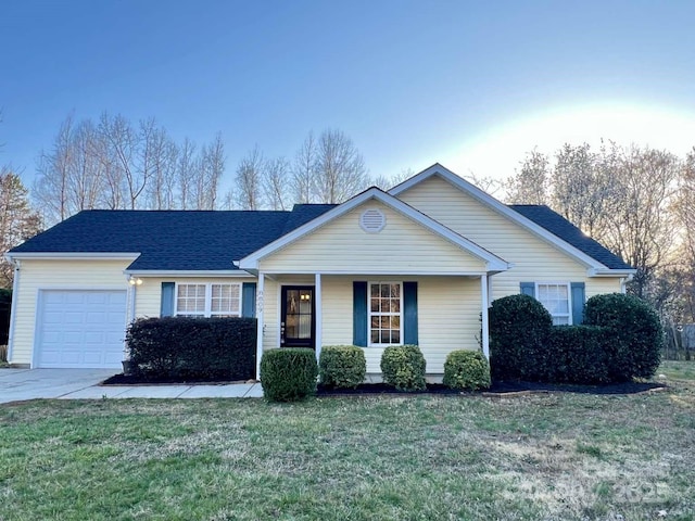 single story home with an attached garage, a shingled roof, driveway, and a front yard