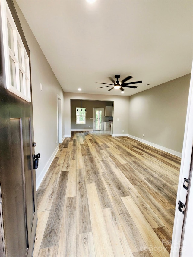 1247 Beltline Rd Unit 1, Chester, SC 29706 - unfurnished living room featuring light wood-style flooring and ceiling fan
