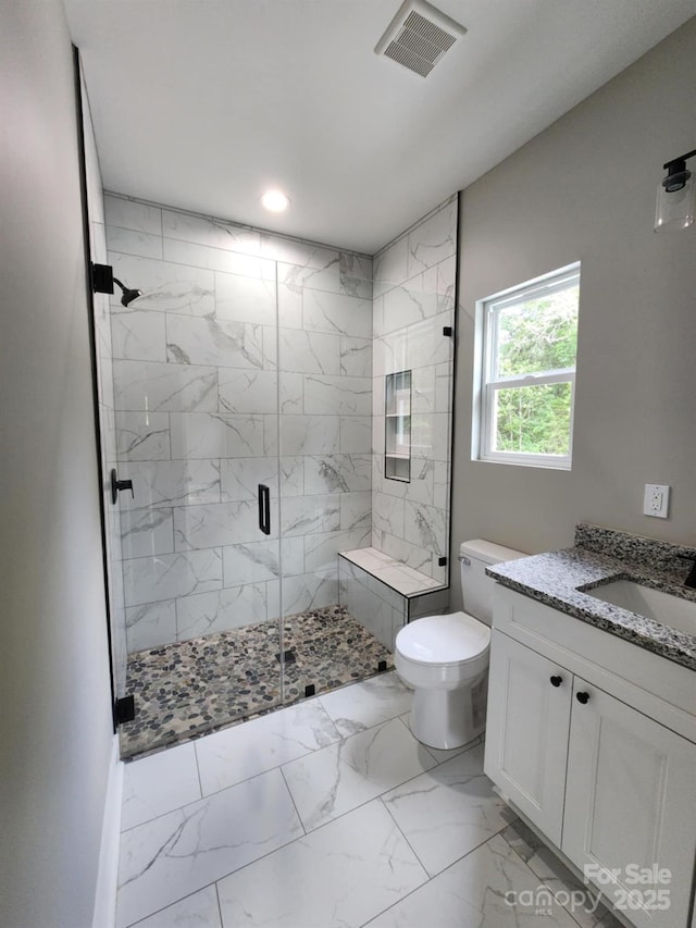 1247 Beltline Rd Unit 1, Chester, SC 29706 - full bath featuring marble finish flooring, a stall shower, vanity, and recessed lighting