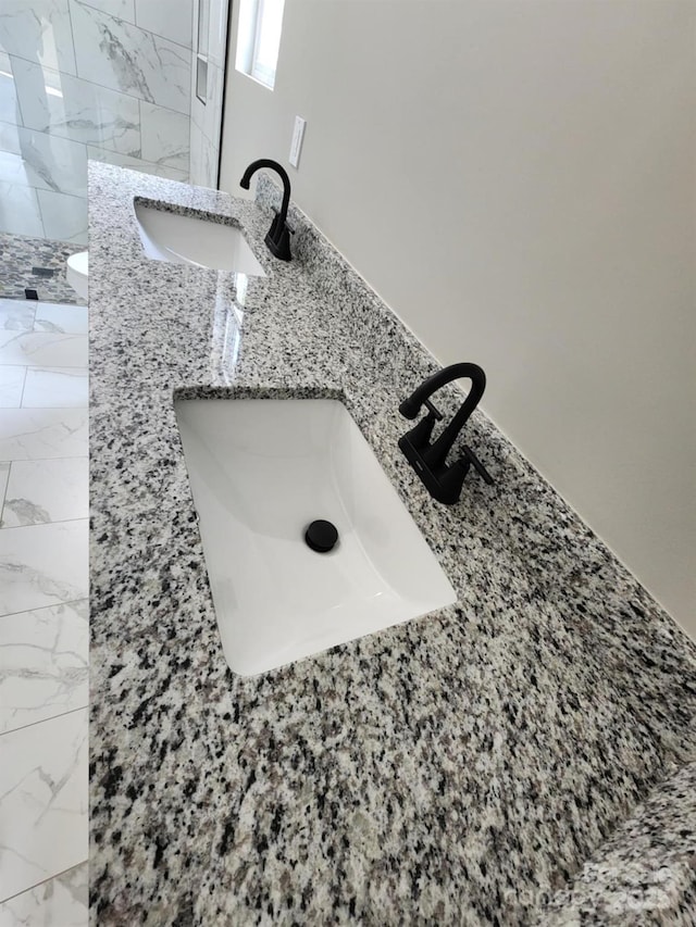 1247 Beltline Rd Unit 1, Chester, SC 29706 - bathroom view of double vanity and a marble finish shower