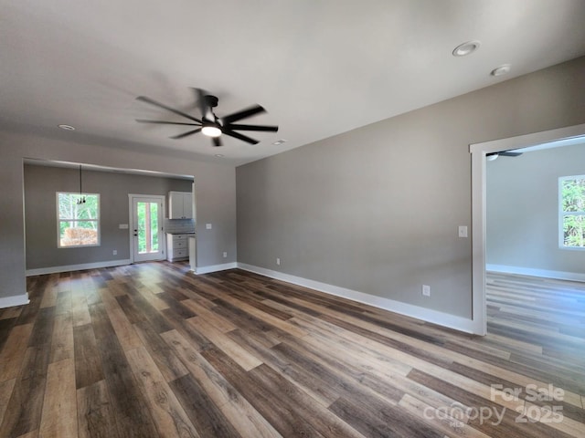 1247 Beltline Rd Unit 1, Chester, SC 29706 - unfurnished living room with dark wood-type flooring, ceiling fan, and recessed lighting